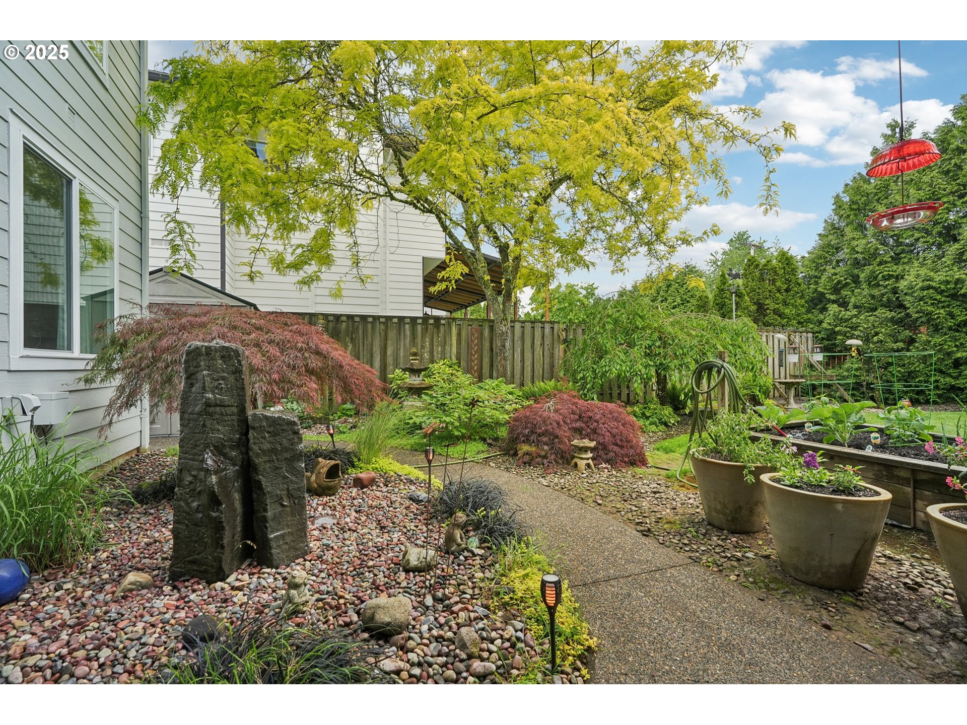 4709 Southeast Antelope Hills Gresham, OR 97080 - Photo 42 of 48 a view of a backyard with plants and garden