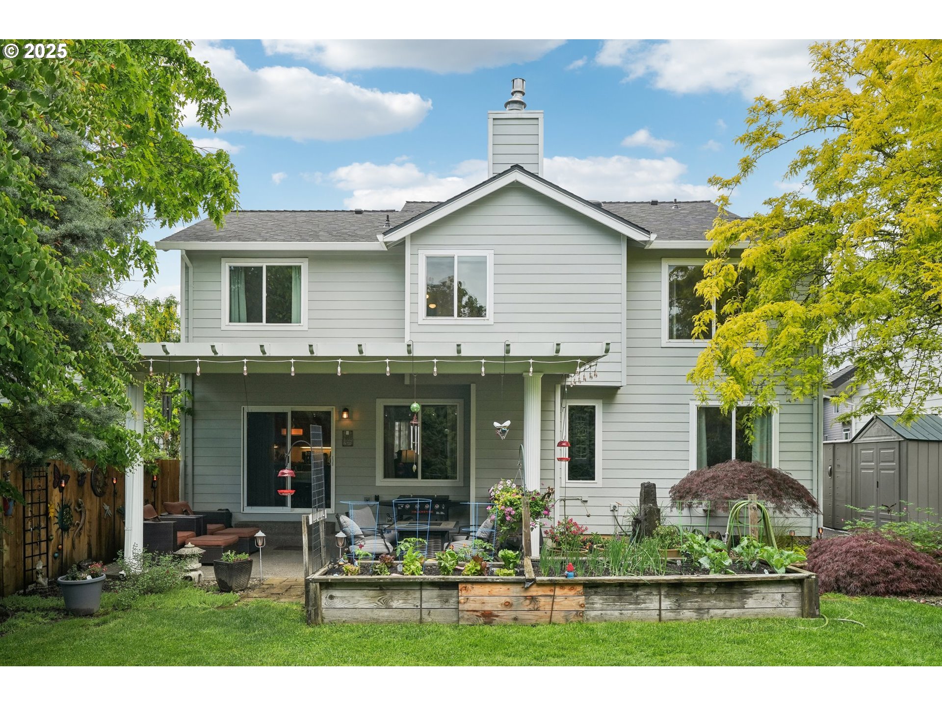 4709 Southeast Antelope Hills Gresham, OR 97080 - Photo 47 of 48 a view of a house with sitting area and garden