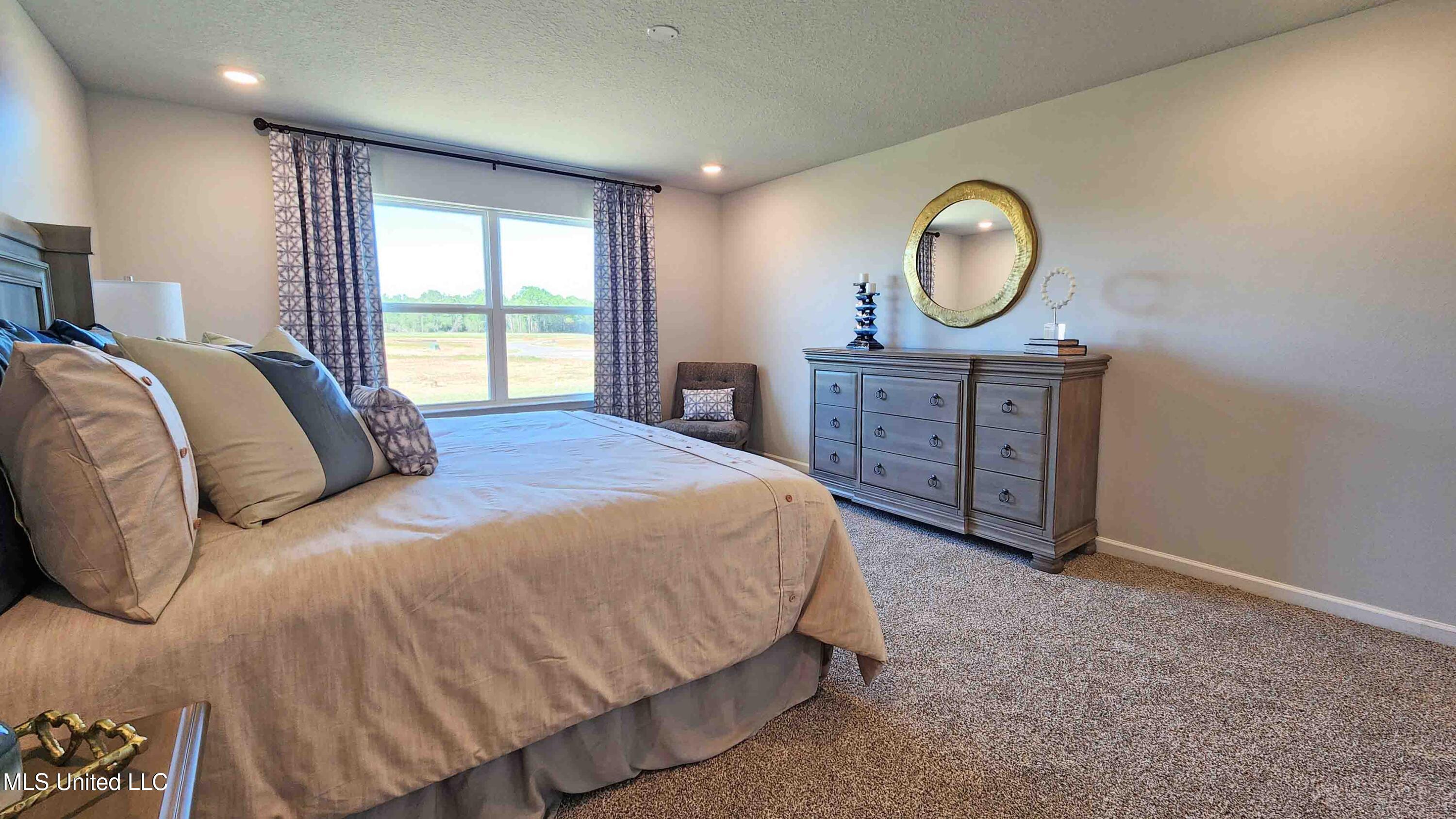 13409 Pond Ridge Way Gulfport, MS 39503 - Photo 20 of 34 Primary Bedroom