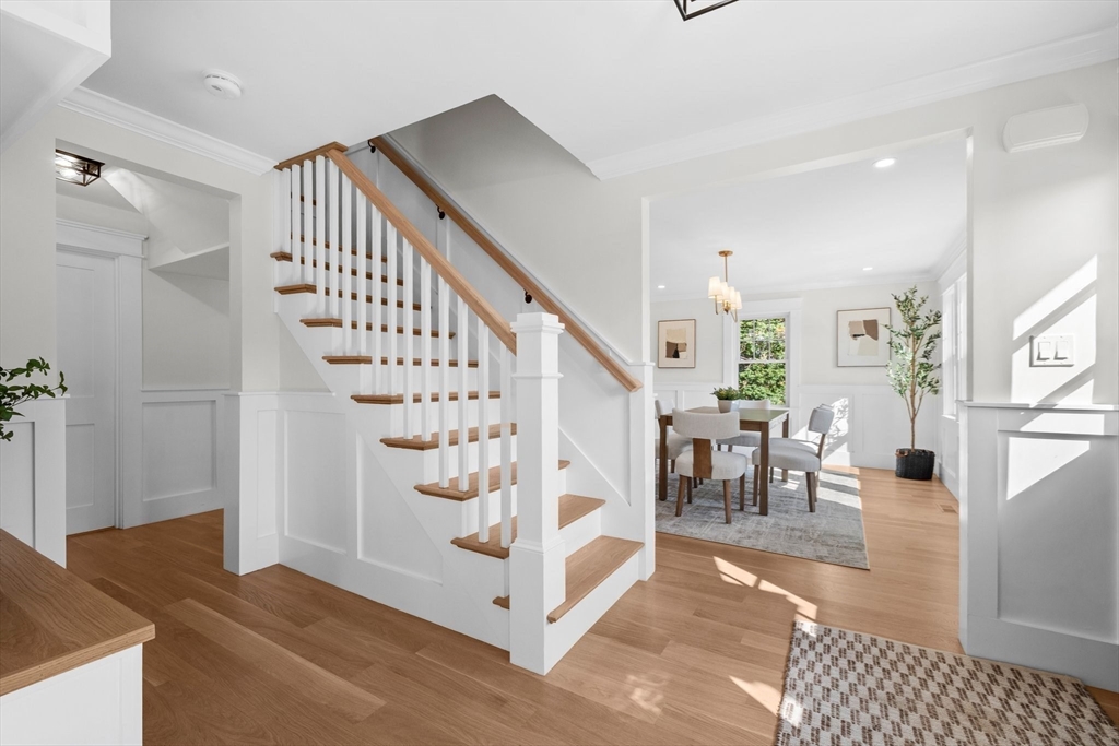 26 Holman Road Newton, MA 02466 - Photo 11 of 33 a view of entryway and hall with wooden floor