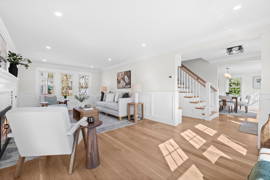 26 Holman Road Newton, MA 02466 - Photo 14 of 33 a living room with furniture and a wooden floor