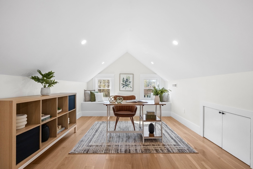 26 Holman Road Newton, MA 02466 - Photo 21 of 33 a living room with furniture and a wooden floor
