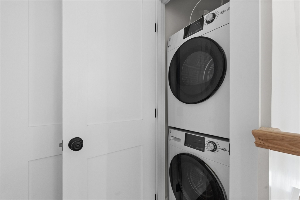 26 Holman Road Newton, MA 02466 - Photo 28 of 33 a utility room with dryer and washer