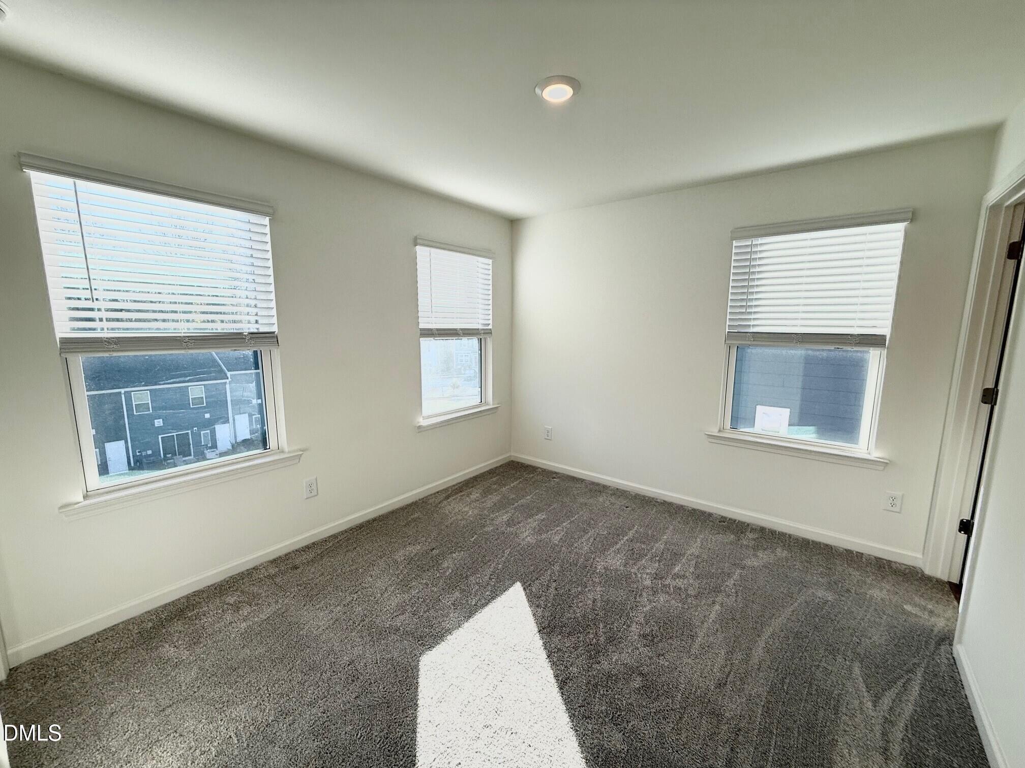 332 Hacksaw Trail Raleigh, NC 27610 - Photo 15 of 29 a view of an empty room with a window