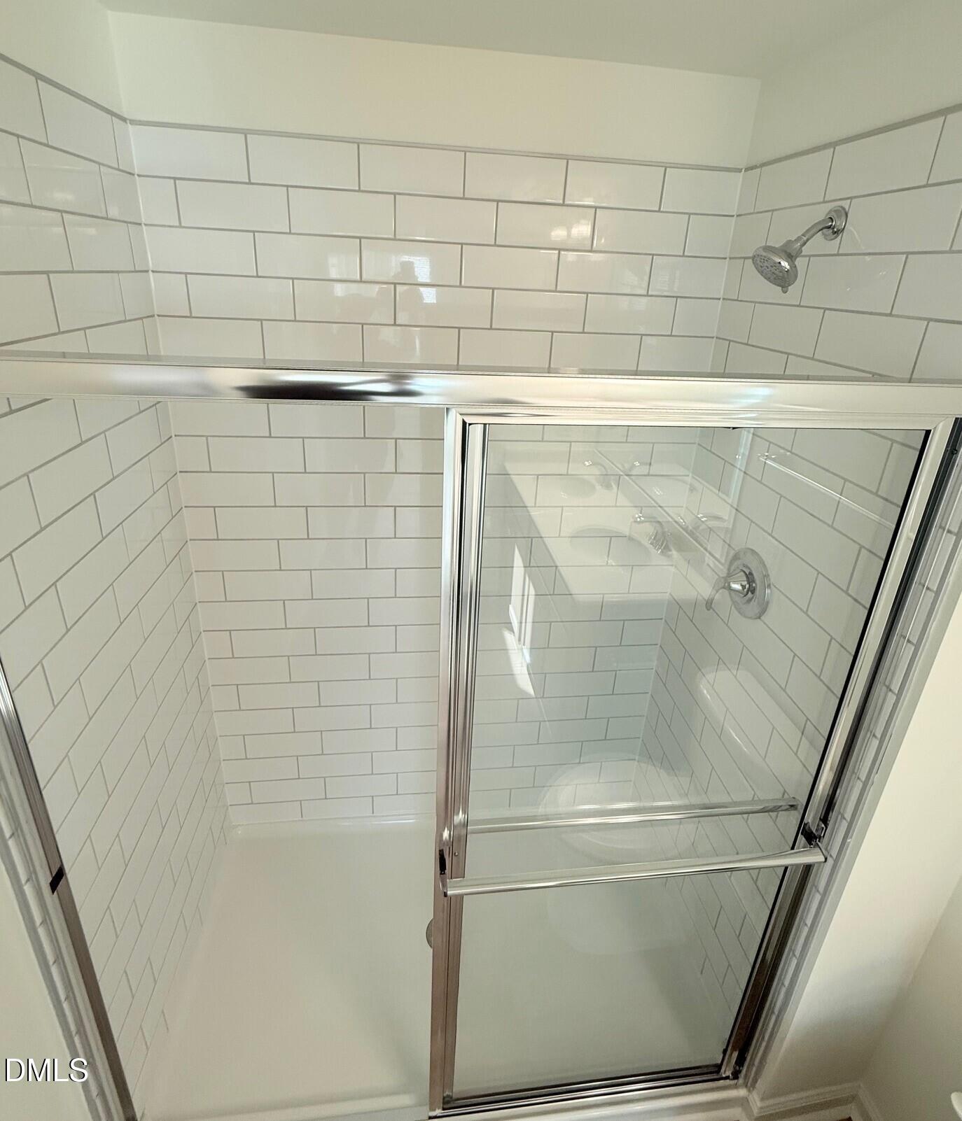 332 Hacksaw Trail Raleigh, NC 27610 - Photo 20 of 29 a bathroom with a shower