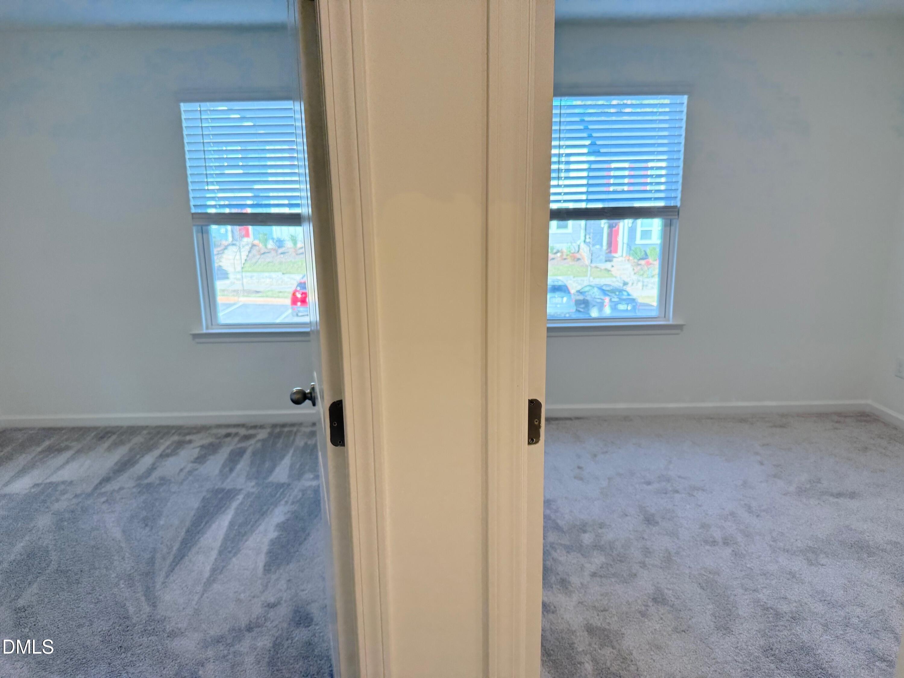 332 Hacksaw Trail Raleigh, NC 27610 - Photo 21 of 29 a view of an empty room with a window