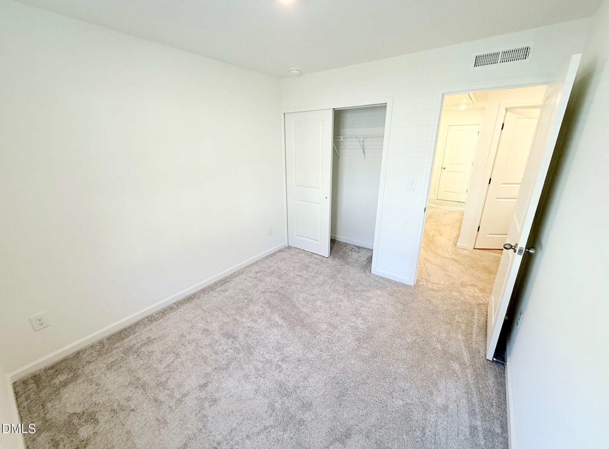 332 Hacksaw Trail Raleigh, NC 27610 - Photo 22 of 29 a view of an empty room