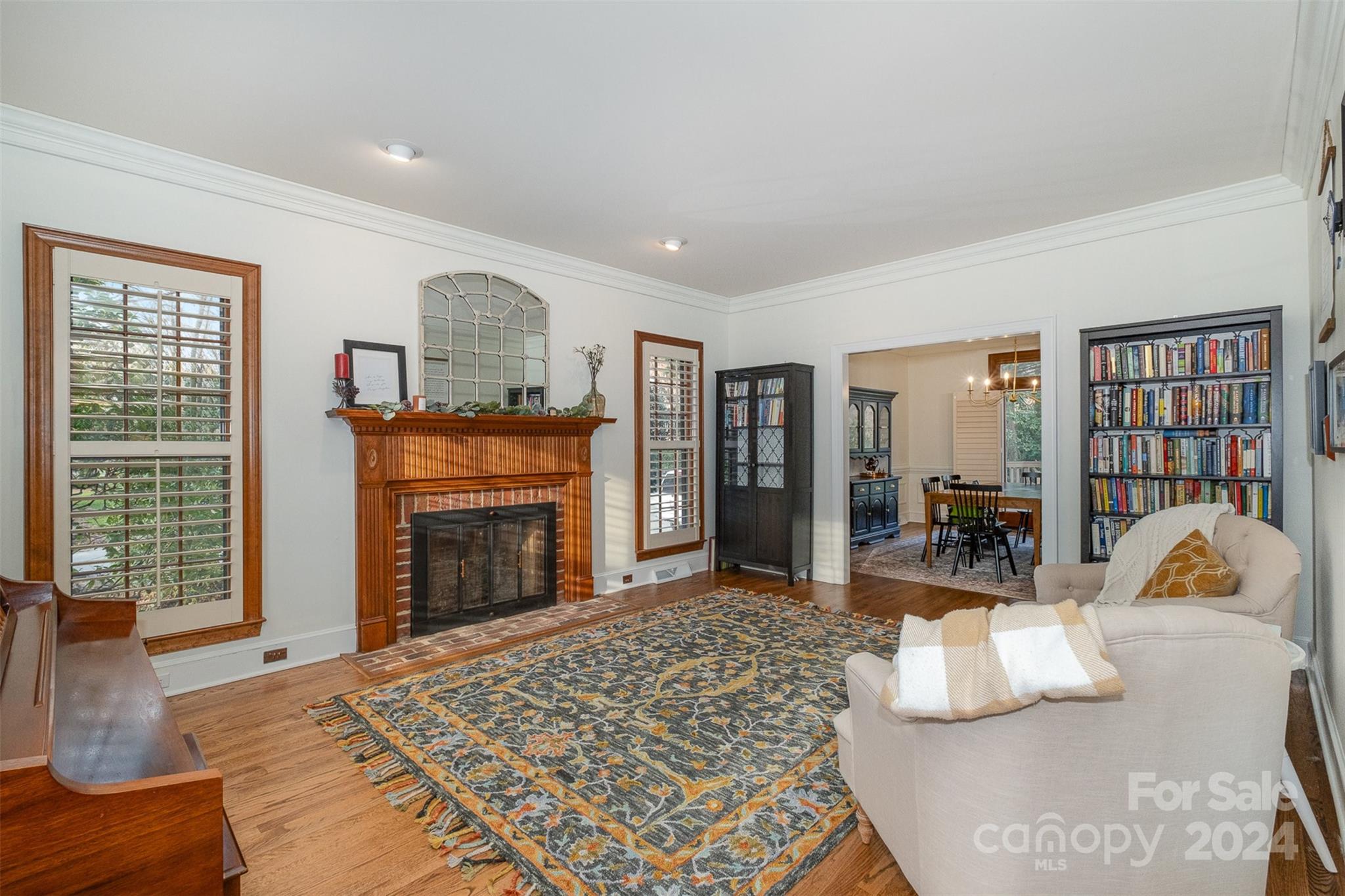 10264 Foxhall Drive Charlotte, NC 28210 - Photo 12 of 26 a living room with furniture large window and fireplace