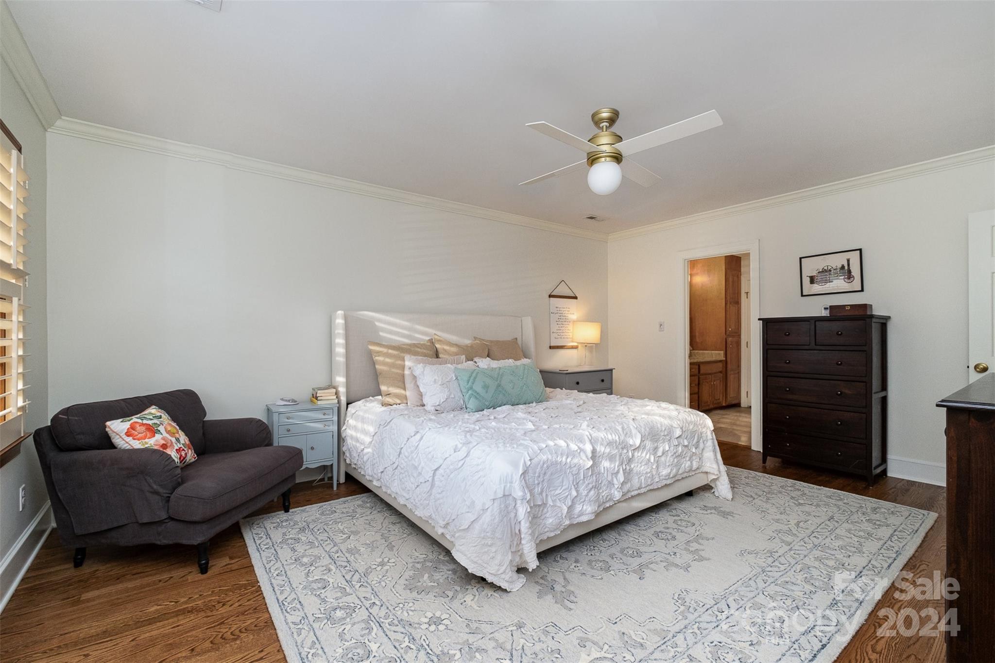 10264 Foxhall Drive Charlotte, NC 28210 - Photo 15 of 26 a bedroom with a bed and ceiling fan