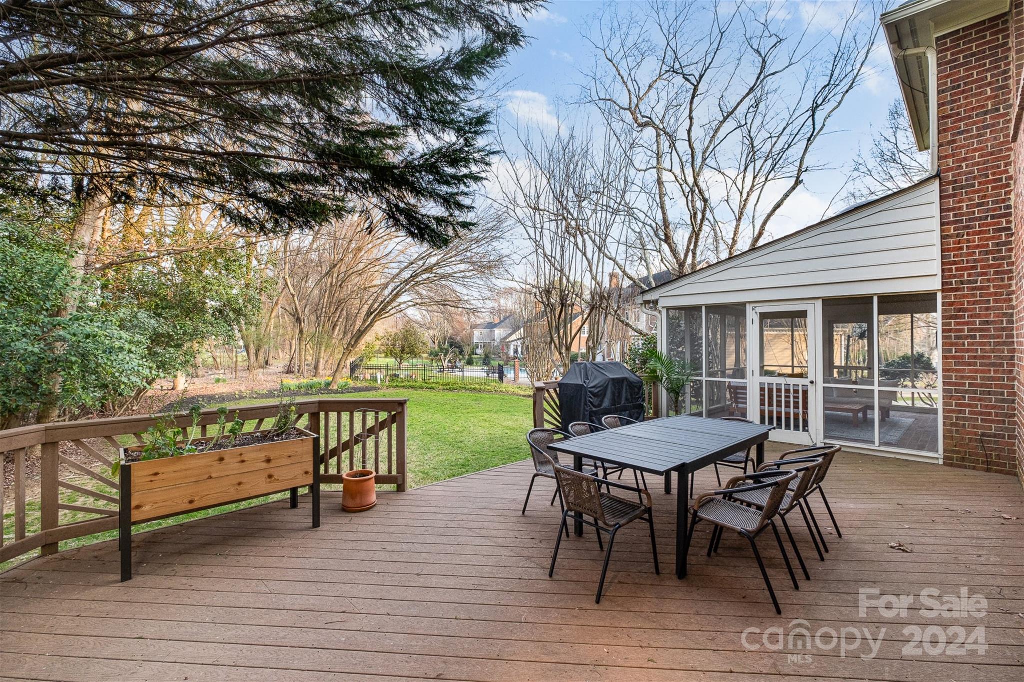 10264 Foxhall Drive Charlotte, NC 28210 - Photo 24 of 26 a view of a table and chairs on the roof deck