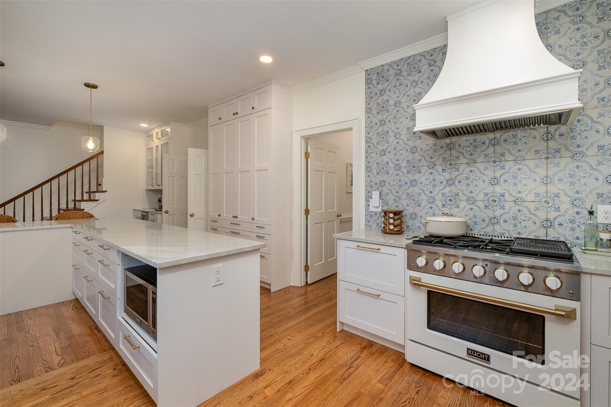 10264 Foxhall Drive Charlotte, NC 28210 - Photo 3 of 26 a kitchen with a stove and a sink