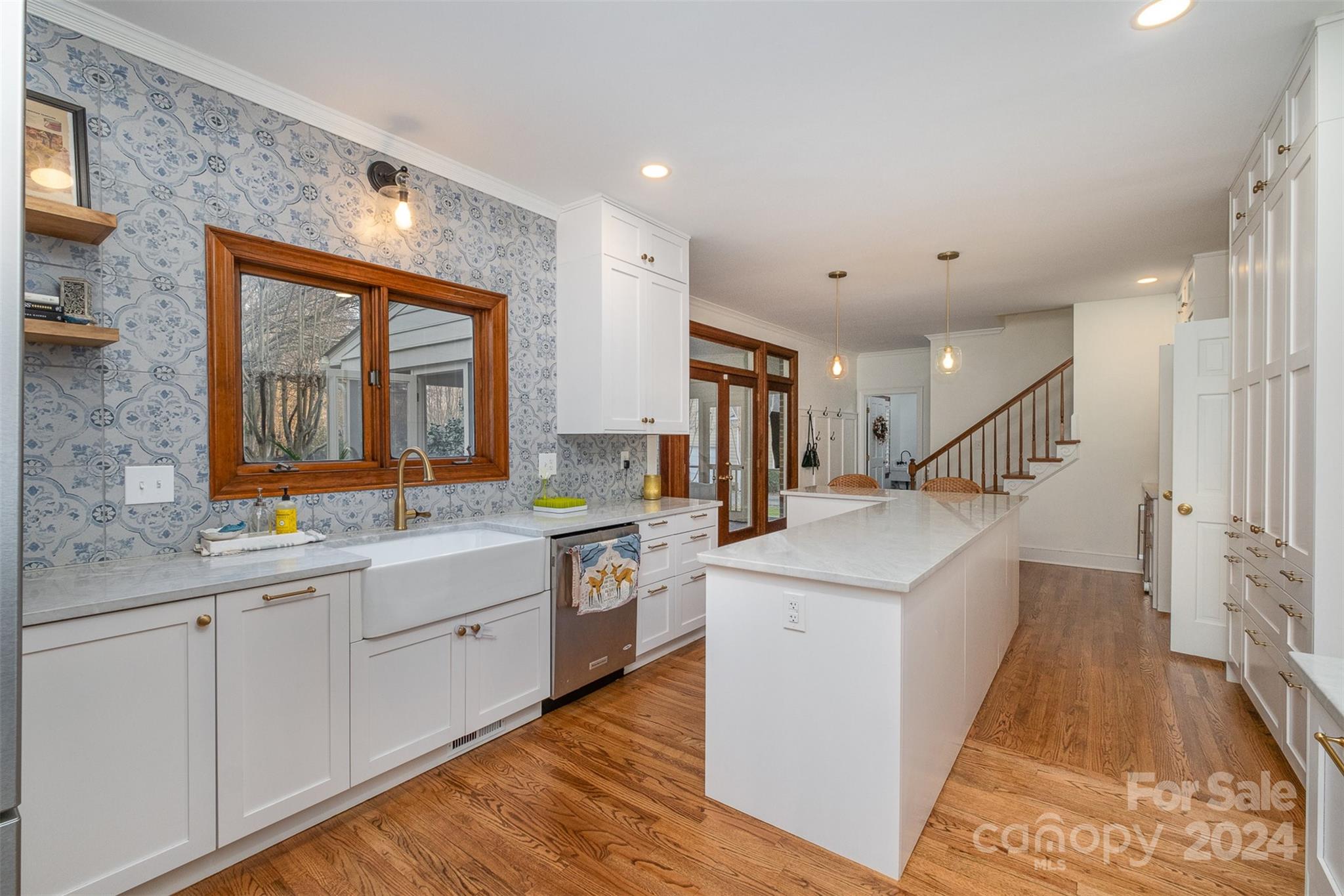 10264 Foxhall Drive Charlotte, NC 28210 - Photo 4 of 26 a kitchen with sink and cabinets