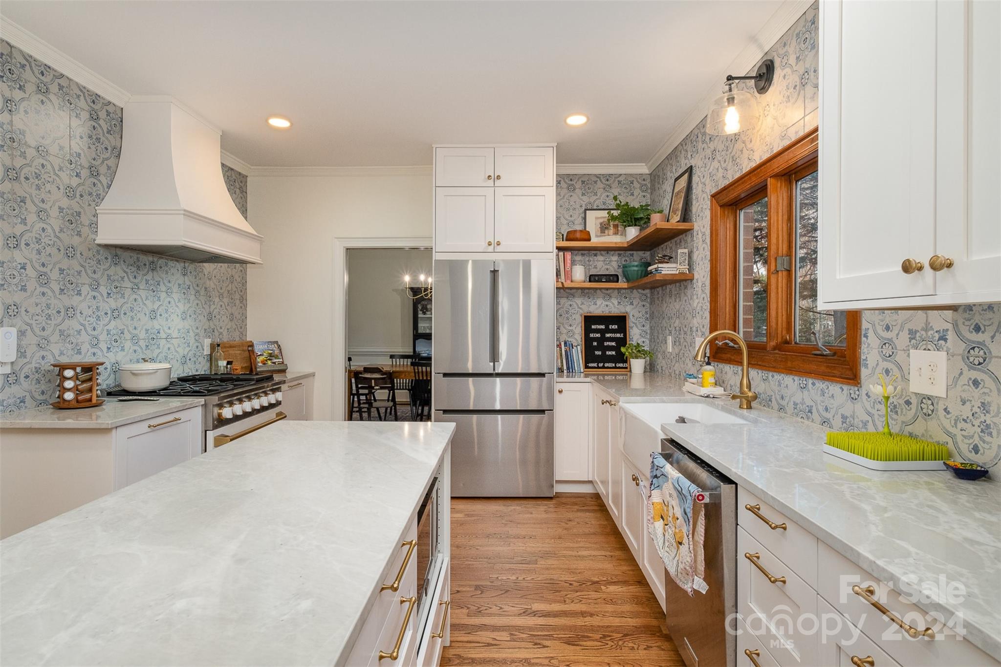 10264 Foxhall Drive Charlotte, NC 28210 - Photo 5 of 26 a kitchen with stainless steel appliances granite countertop a sink refrigerator and cabinets