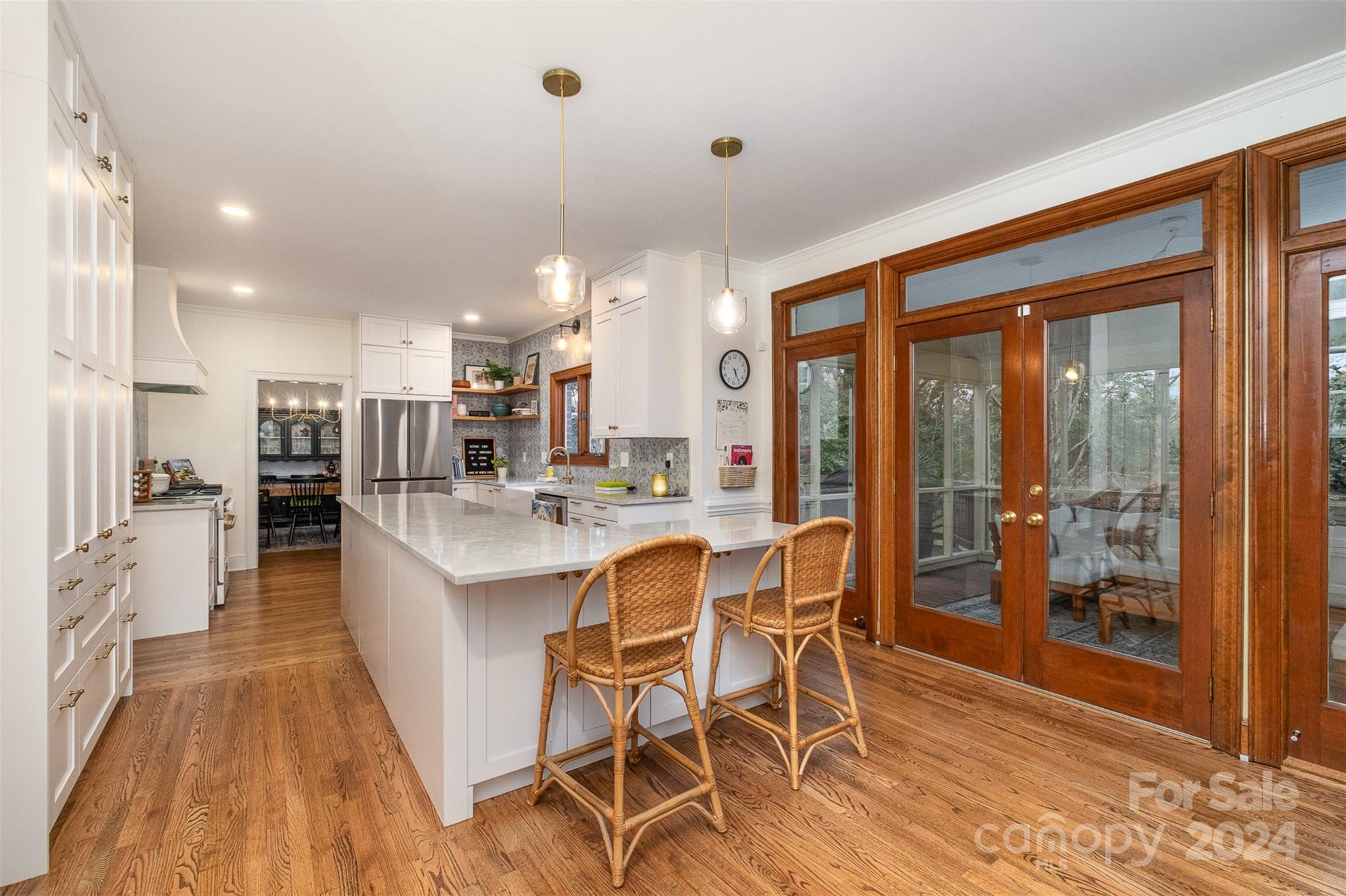 10264 Foxhall Drive Charlotte, NC 28210 - Photo 7 of 26 a large kitchen with a table and chairs