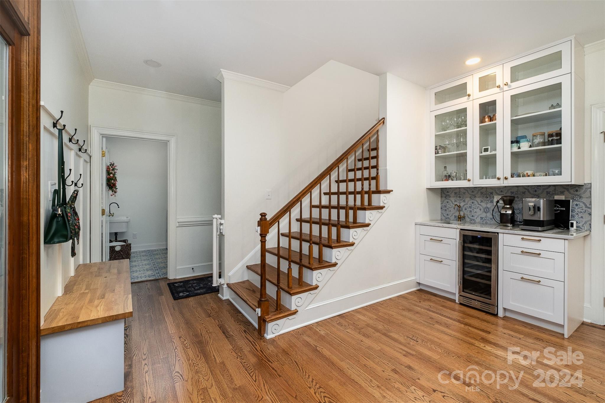 10264 Foxhall Drive Charlotte, NC 28210 - Photo 8 of 26 a view of a kitchen with wooden floor and electronic appliances