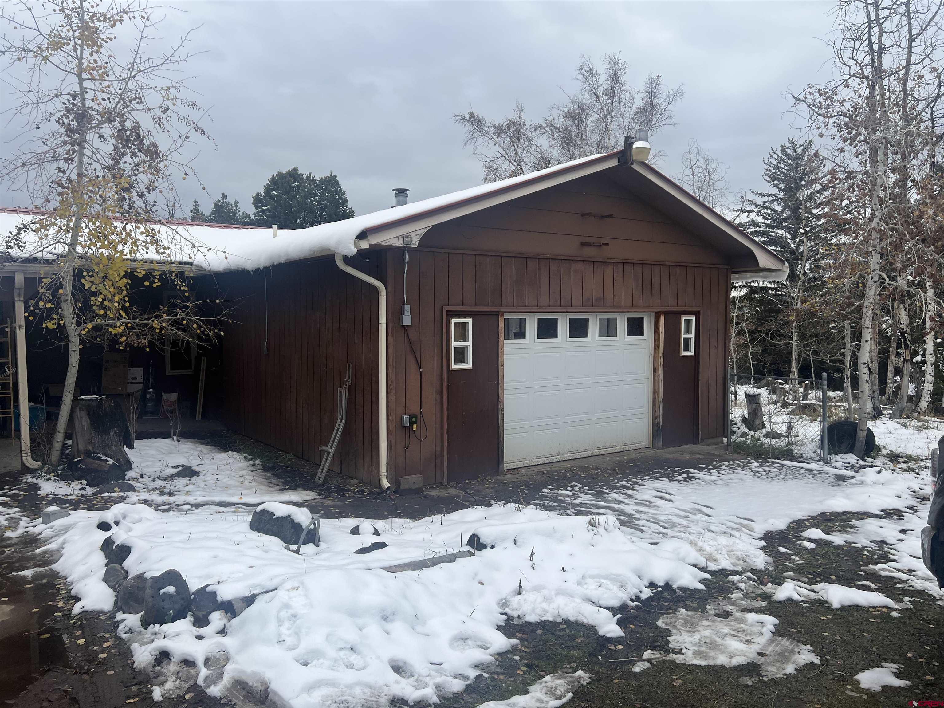 23152 Ute Trail Road Cedaredge, CO 81413 - Photo 1 of 25 a front view of a house