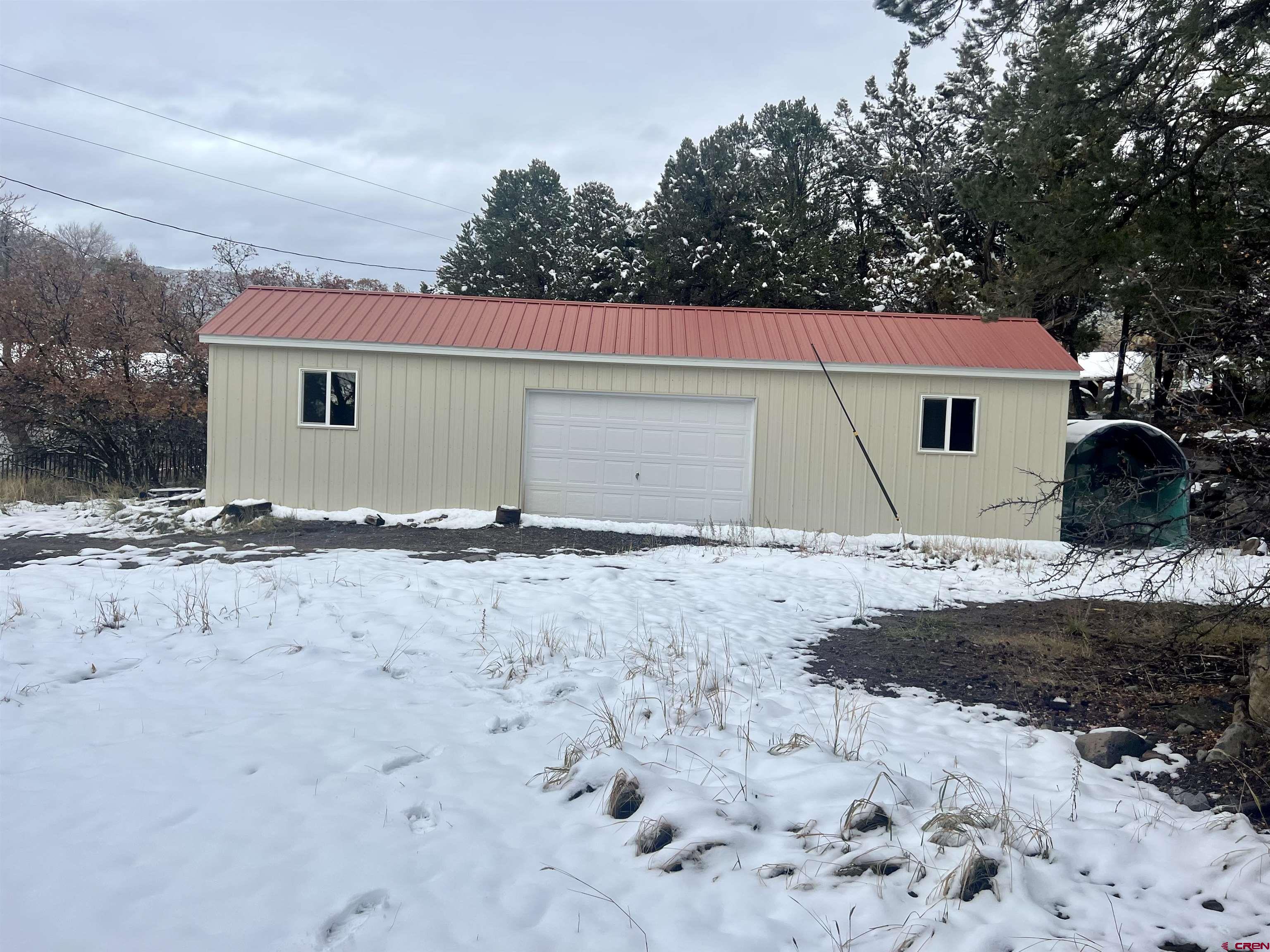23152 Ute Trail Road Cedaredge, CO 81413 - Photo 8 of 25 a view of a house with a yard