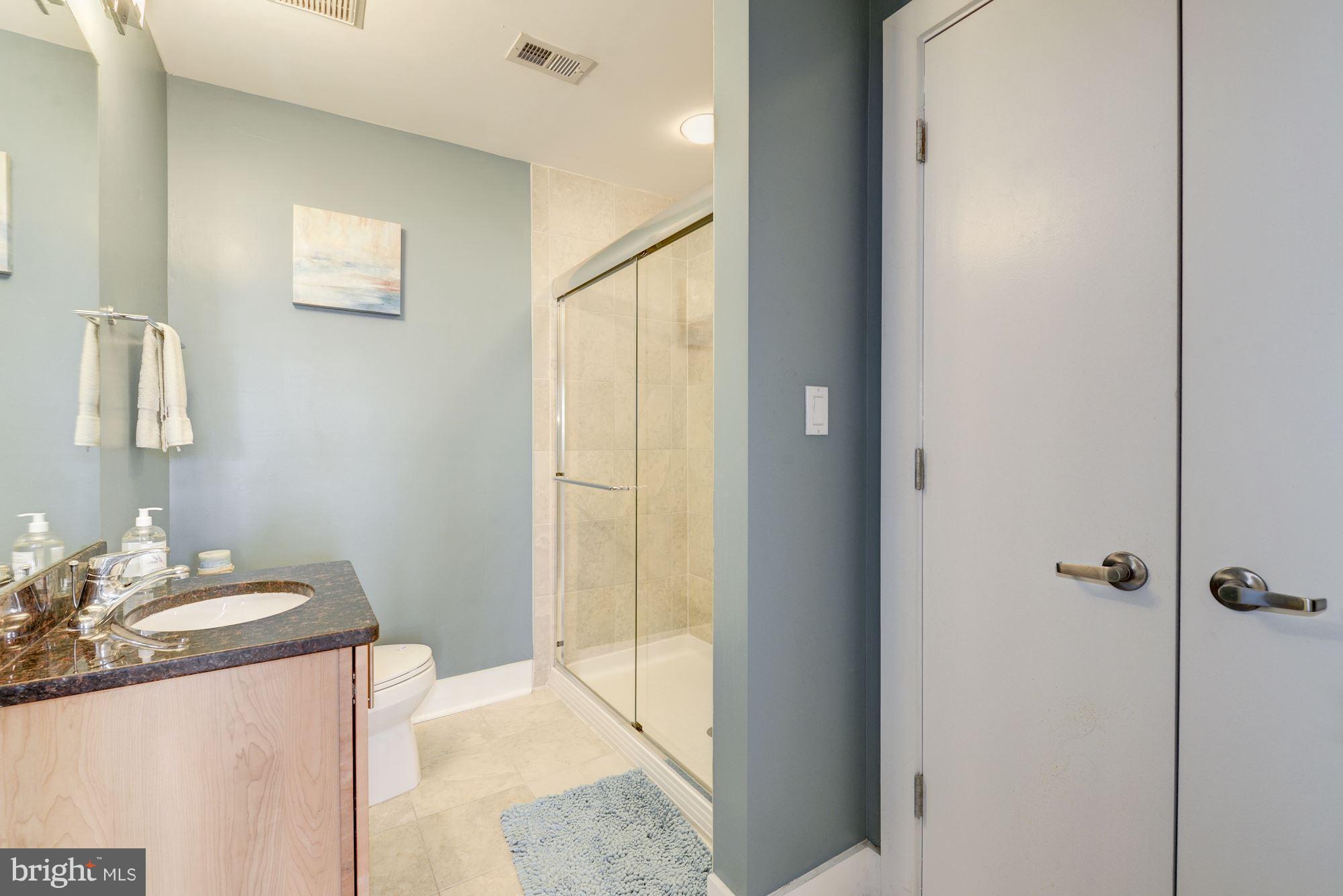 1309 Park Road Northwest, Unit 301 Washington, DC 20010 - Photo 11 of 23 New shower doors just installed in master bath!