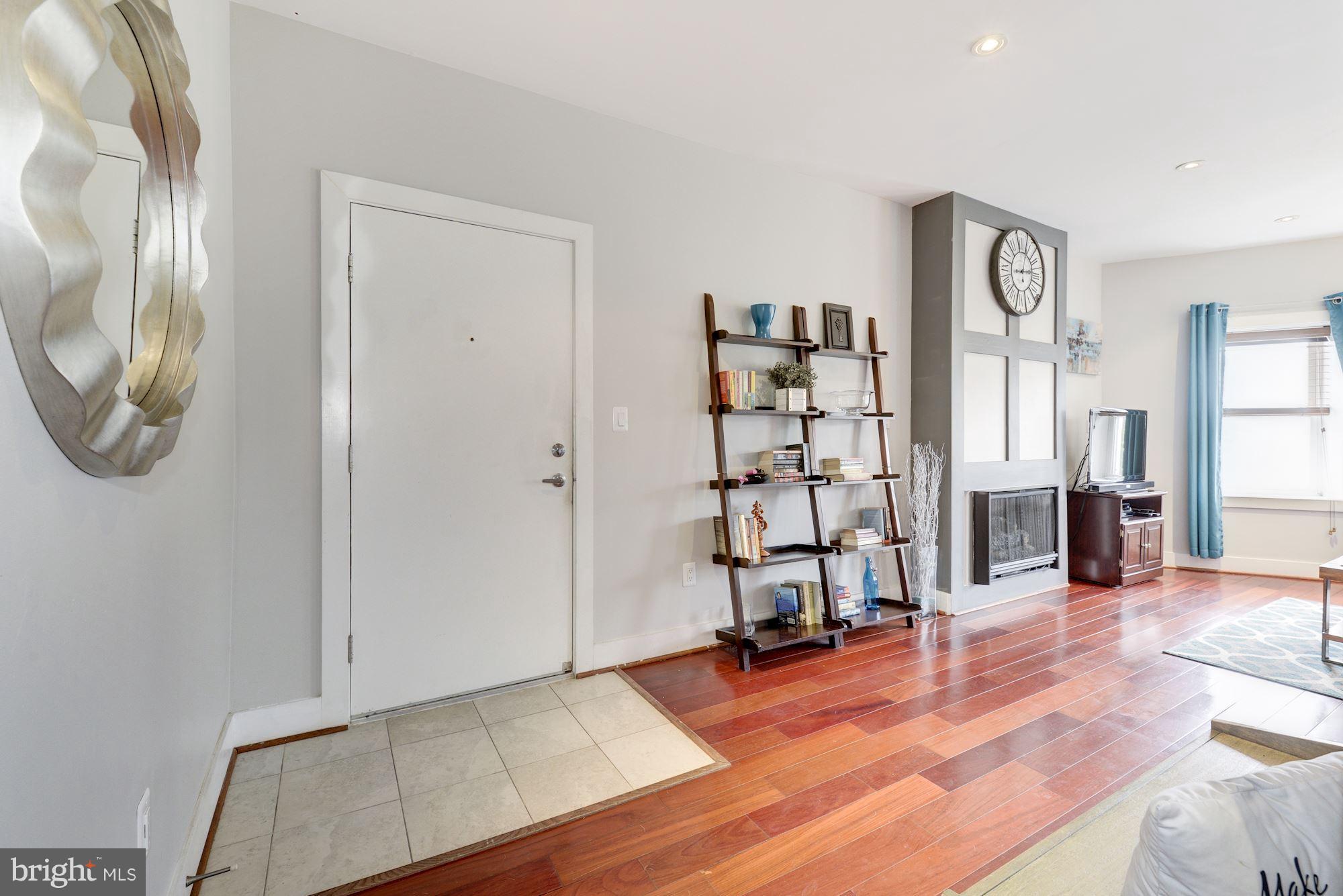 1309 Park Road Northwest, Unit 301 Washington, DC 20010 - Photo 7 of 23 Spaciousness and sun greet you upon entry!