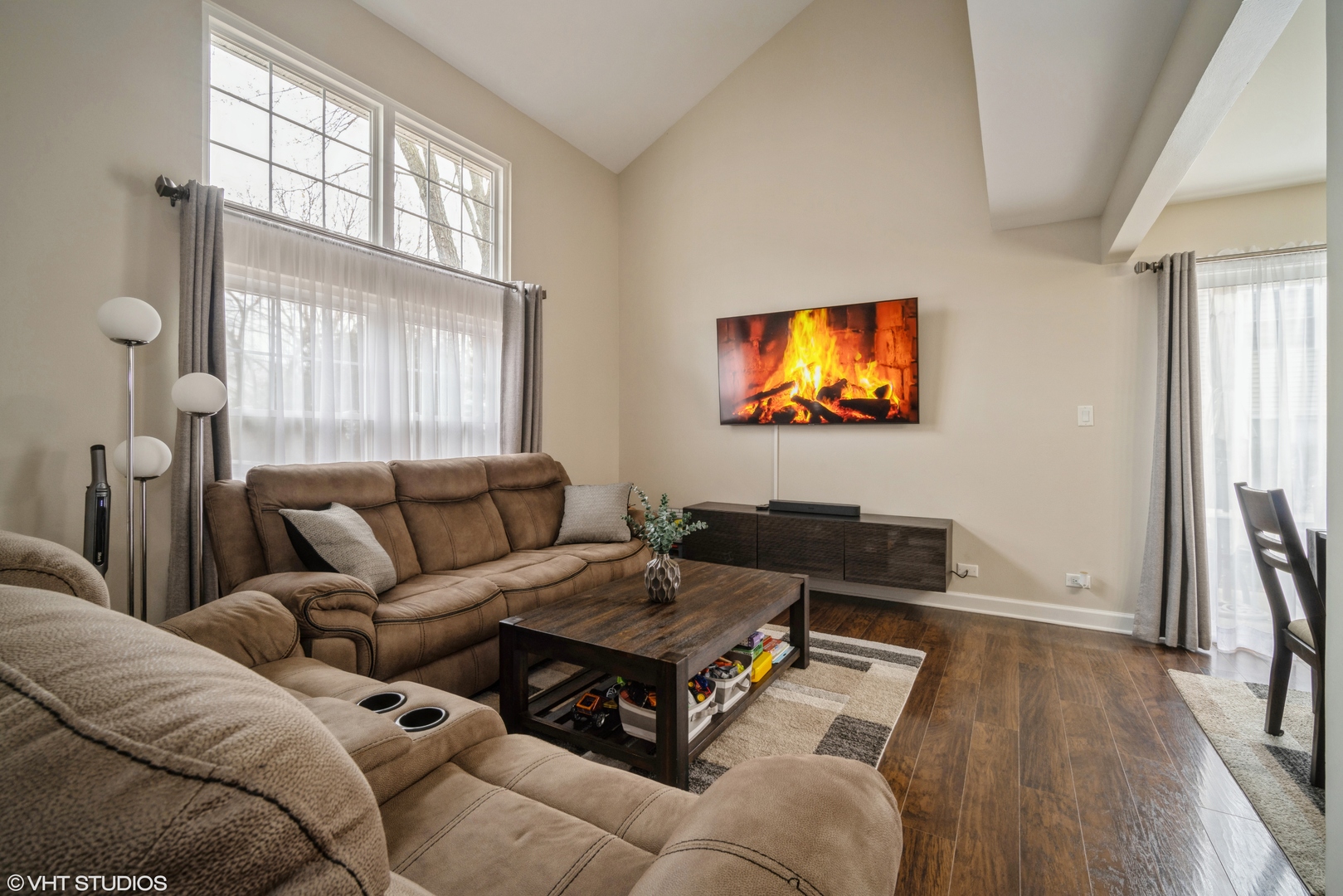 223 Butternut Lane Streamwood, IL 60107 - Photo 2 of 11 a living room with furniture and a flat screen tv
