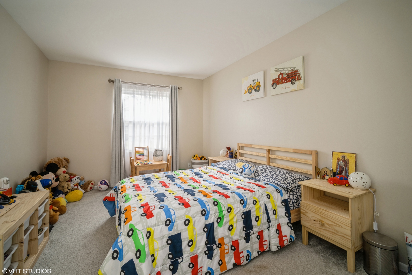 223 Butternut Lane Streamwood, IL 60107 - Photo 8 of 11 a bedroom with a bed and a window