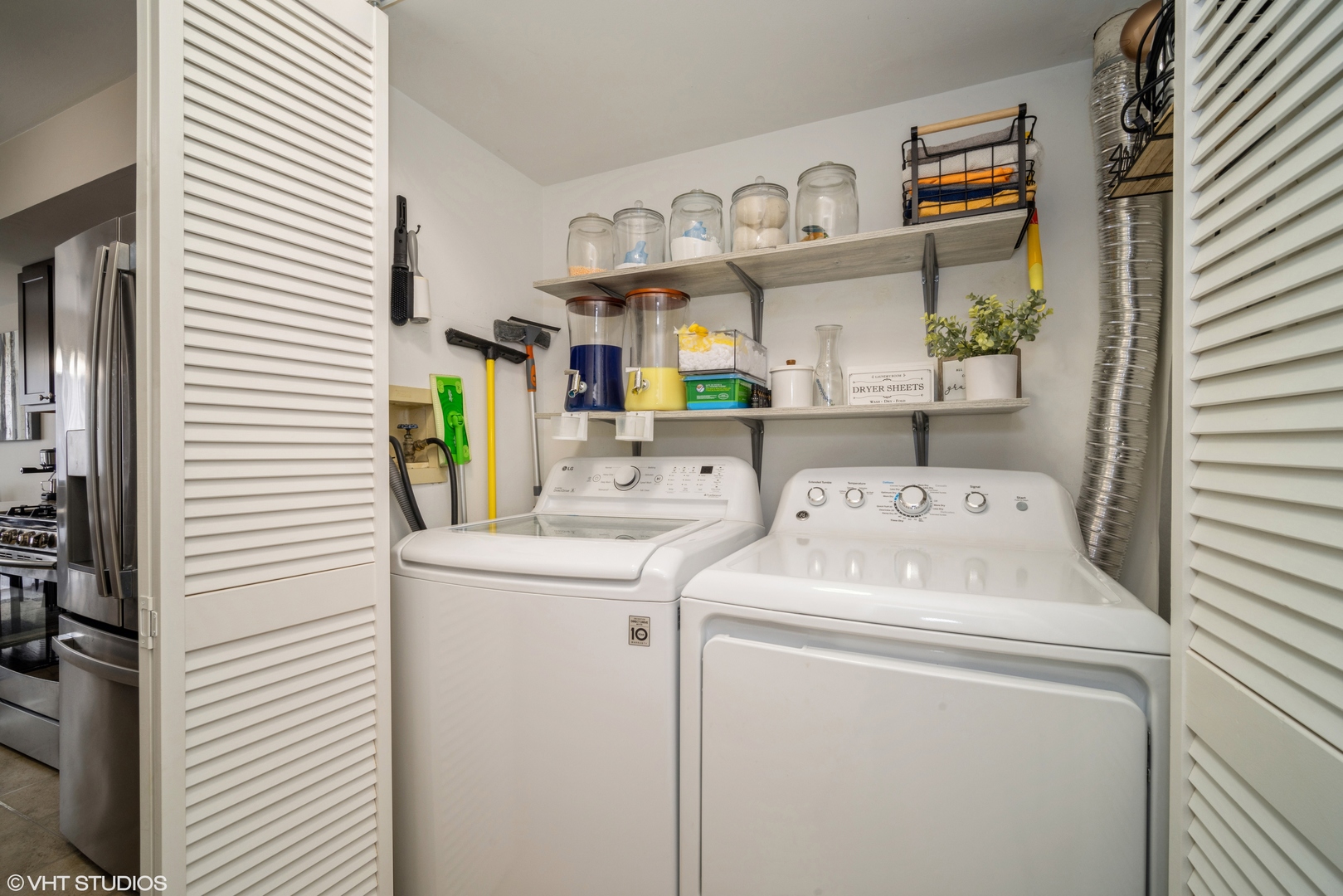 223 Butternut Lane Streamwood, IL 60107 - Photo 10 of 11 a utility room with dryer and washer