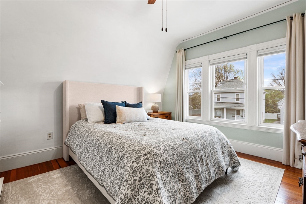 11 Draper Road Framingham, MA 01702 - Photo 15 of 23 a bedroom with a large bed and a large window