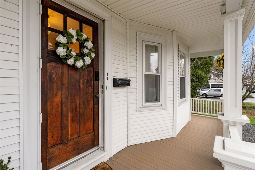 11 Draper Road Framingham, MA 01702 - Photo 23 of 23 a view of porch with wooden floor and a potted plant