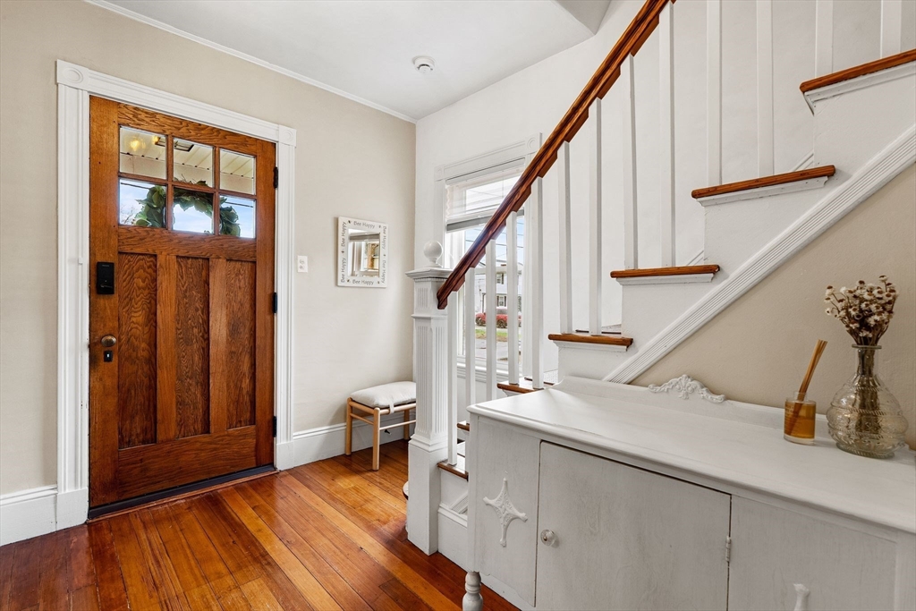 11 Draper Road Framingham, MA 01702 - Photo 3 of 23 a view of entryway and hall with wooden floor
