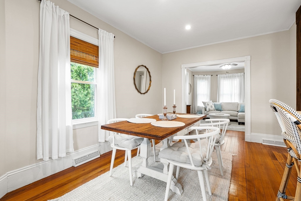 11 Draper Road Framingham, MA 01702 - Photo 10 of 23 a view of a dining room with furniture and wooden floor
