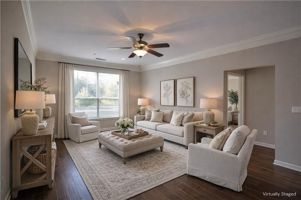 10 Perimeter Summit Boulevard, Unit 4139 Atlanta, GA 30319 - Photo 2 of 15 a living room with furniture and a large window