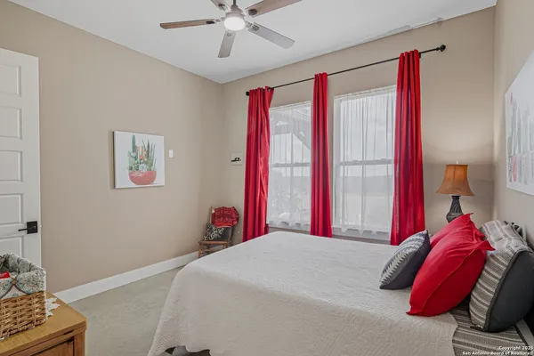 a bed room with a bed and a window