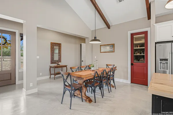 a view of a dining room with furniture