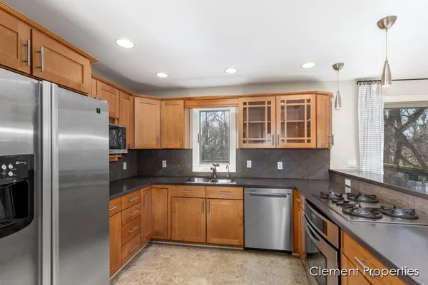 $415,000 | 13544 Kenowa Avenue, Kent City, MI 49330