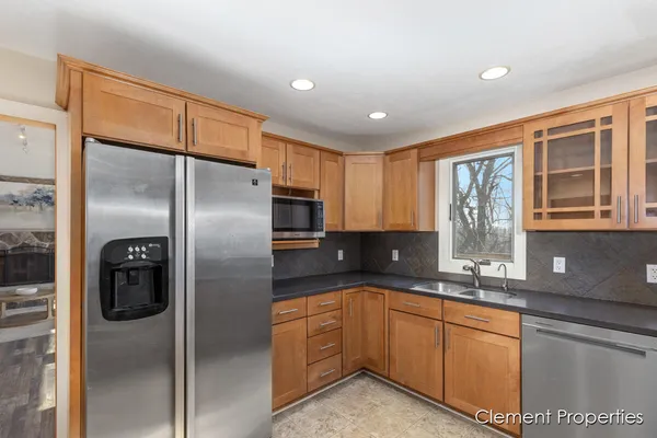 $415,000 | 13544 Kenowa Avenue, Kent City, MI 49330