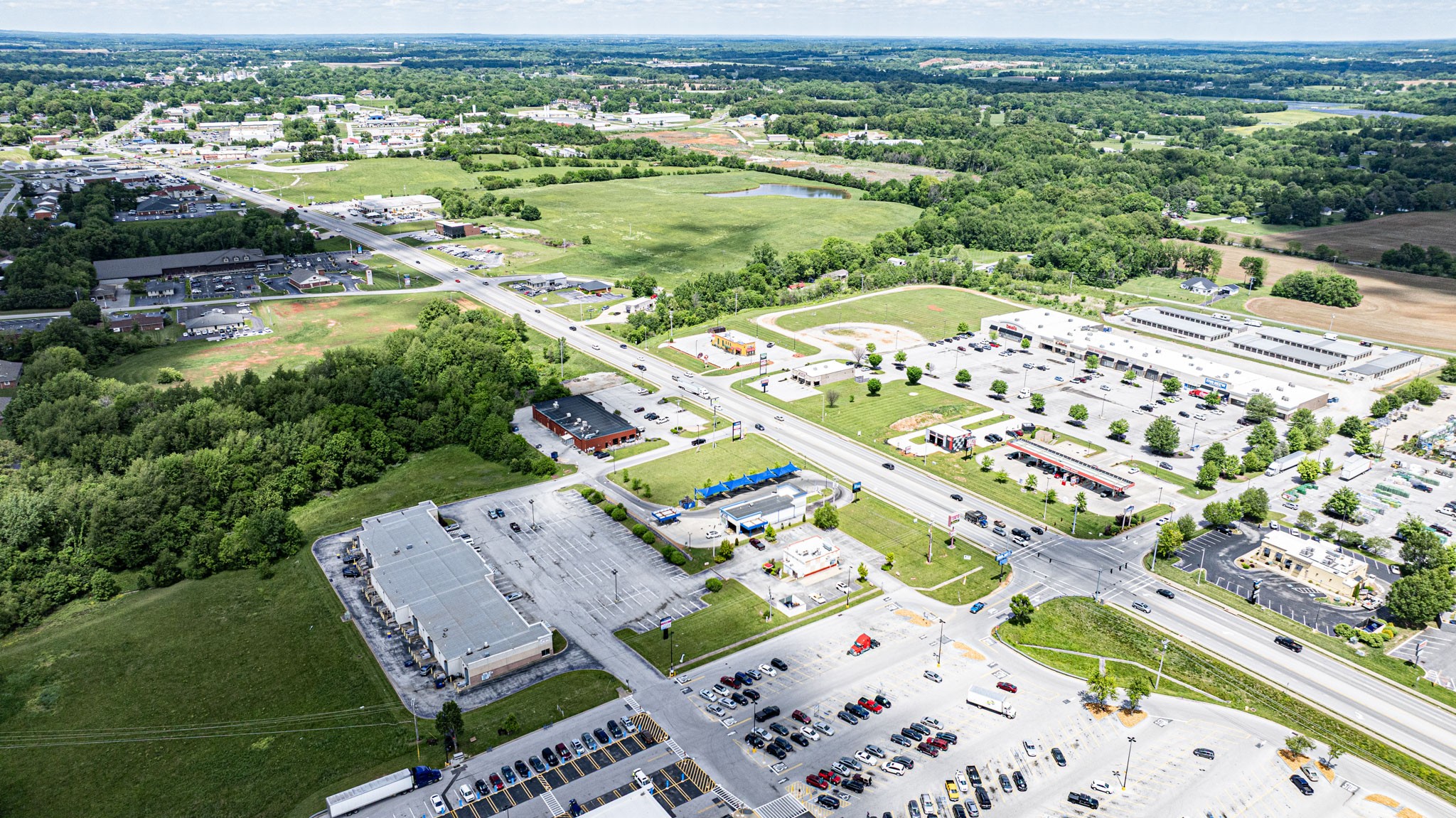 1442 Nashville Road Franklin, KY 42134 - Photo 17 of 20 an aerial view of a city with lots of residential buildings
