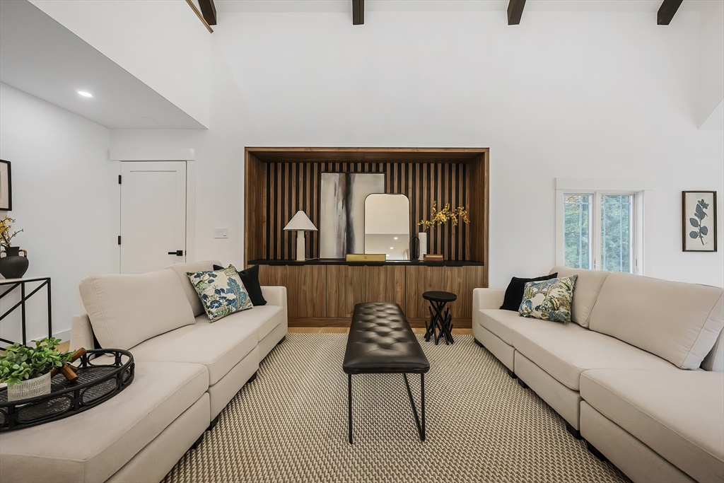 54 Spywood Road Sherborn, MA 01770 - Photo 16 of 42 a living room with furniture and a large window