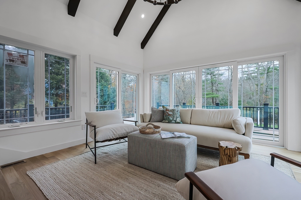 54 Spywood Road Sherborn, MA 01770 - Photo 18 of 42 a living room with furniture and a window