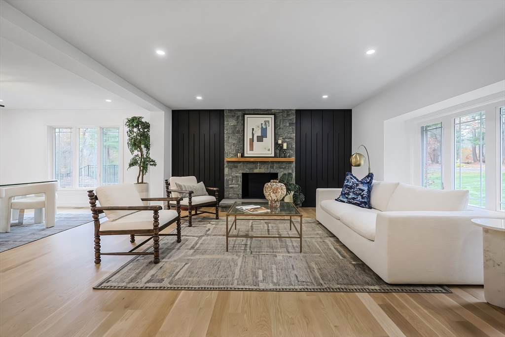 54 Spywood Road Sherborn, MA 01770 - Photo 3 of 42 a living room with furniture and a fireplace