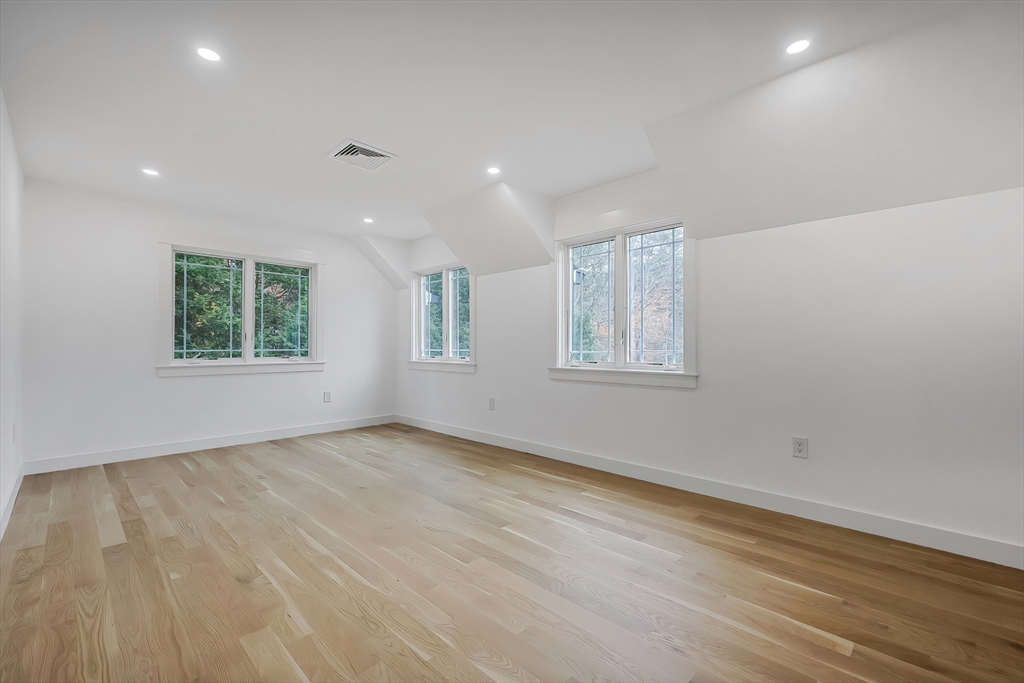 54 Spywood Road Sherborn, MA 01770 - Photo 32 of 42 an empty room with windows
