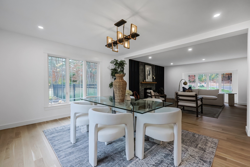 54 Spywood Road Sherborn, MA 01770 - Photo 8 of 42 a view of a dining room with furniture window and wooden floor