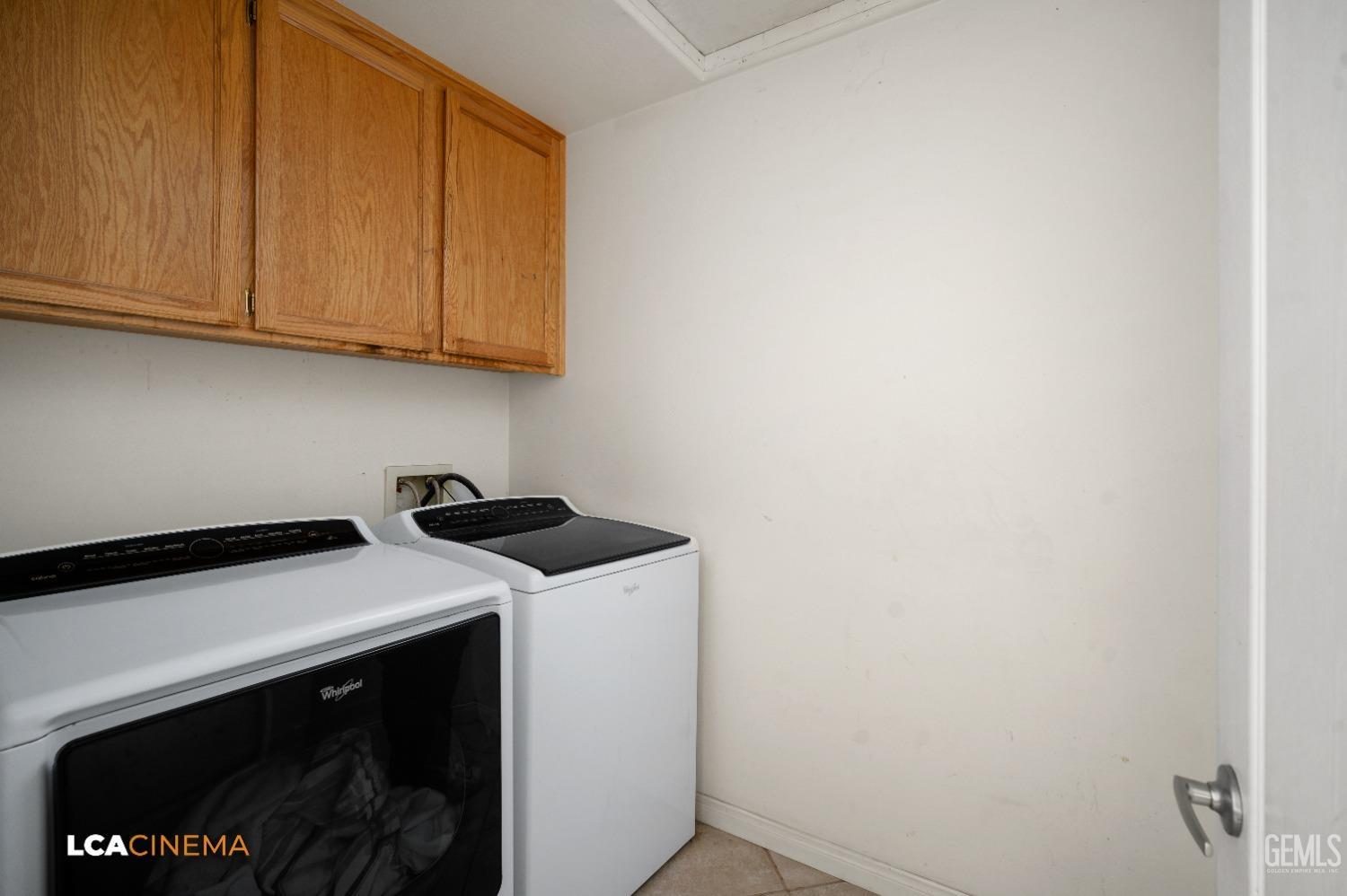 Undisclosed Address Bakersfield, CA 93312 - Photo 12 of 38 a utility room with dryer and washer