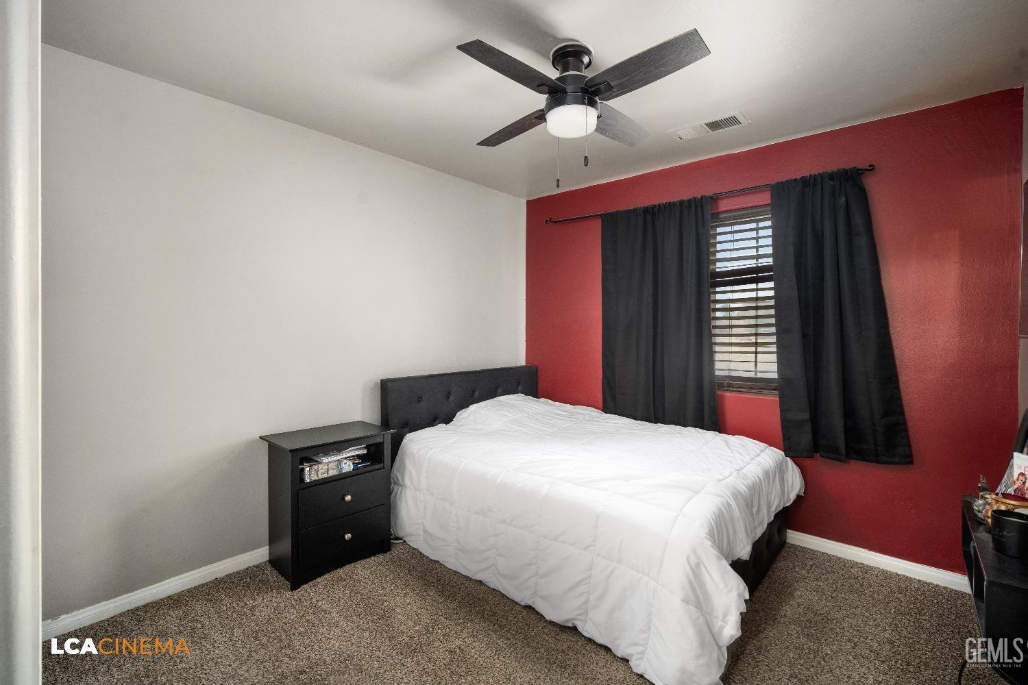 Undisclosed Address Bakersfield, CA 93312 - Photo 13 of 38 a bedroom with a bed and a window