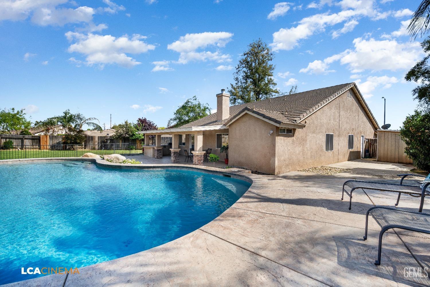 Undisclosed Address Bakersfield, CA 93312 - Photo 25 of 38 a view of a house with pool and sitting area