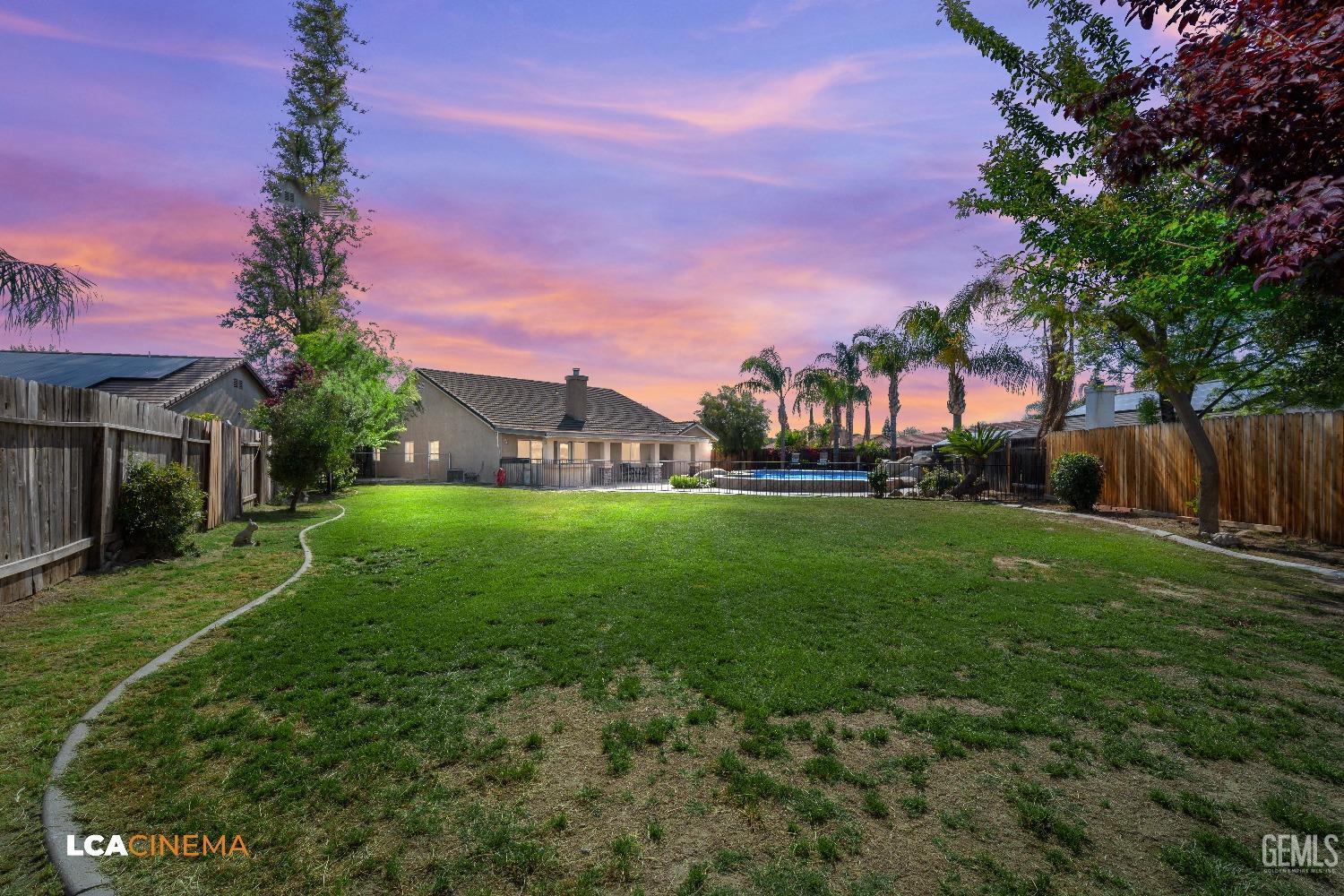 Undisclosed Address Bakersfield, CA 93312 - Photo 27 of 38 a view of house with garden space and street view