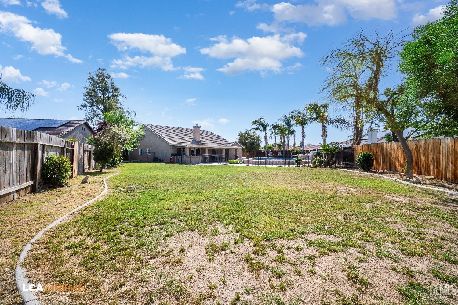 Undisclosed Address Bakersfield, CA 93312 - Photo 28 of 38 a front view of house with yard