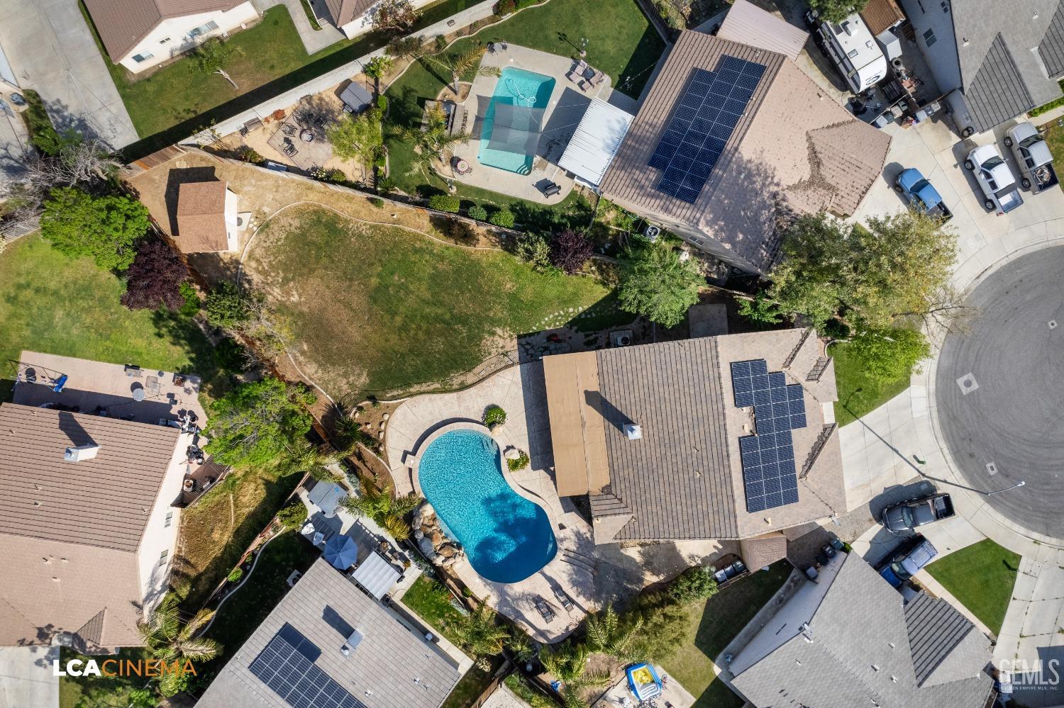 Undisclosed Address Bakersfield, CA 93312 - Photo 31 of 38 an aerial view of a house with swimming pool and outdoor seating