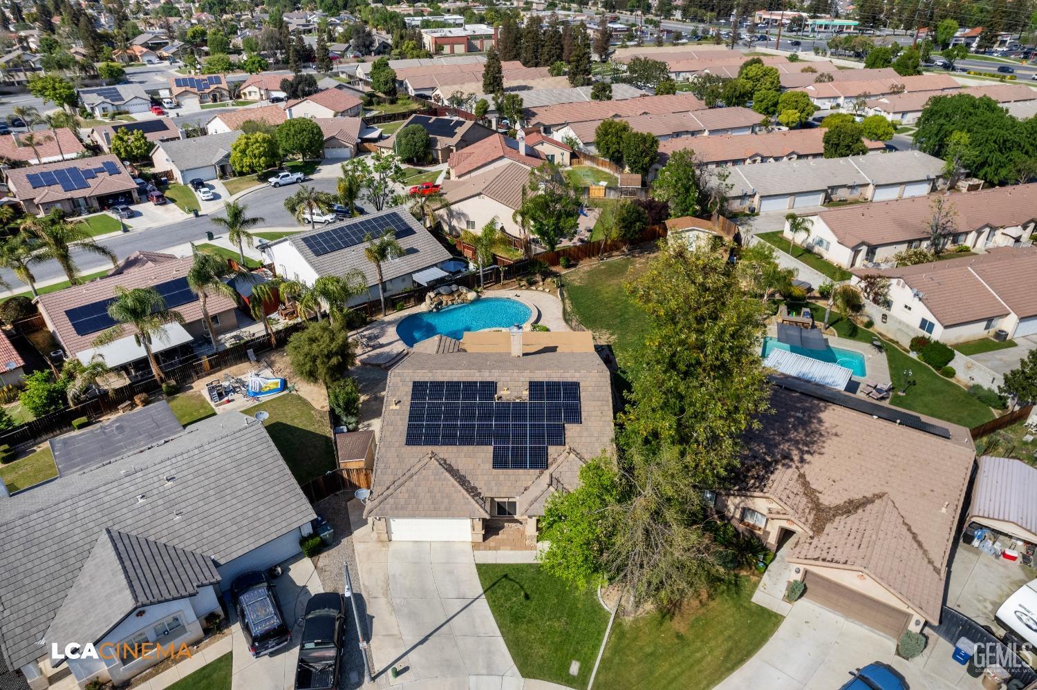 Undisclosed Address Bakersfield, CA 93312 - Photo 32 of 38 an aerial view of a city with lots of residential buildings