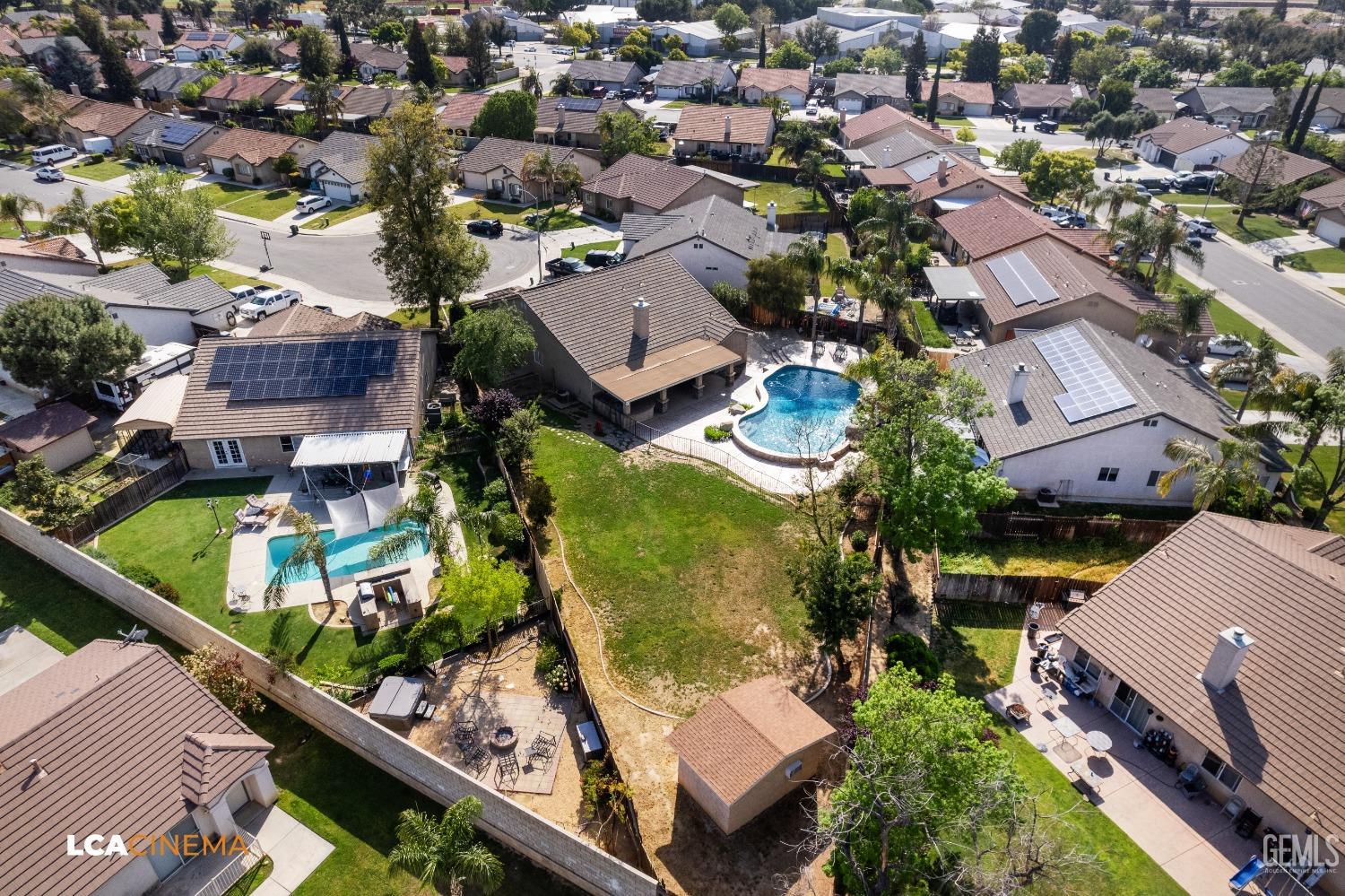 Undisclosed Address Bakersfield, CA 93312 - Photo 35 of 38 an aerial view of a house with a garden