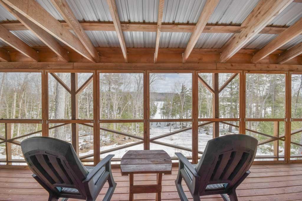 83 Ellen's Way Monson, ME 04464 - Photo 25 of 35 Relax on the screened in porch and...